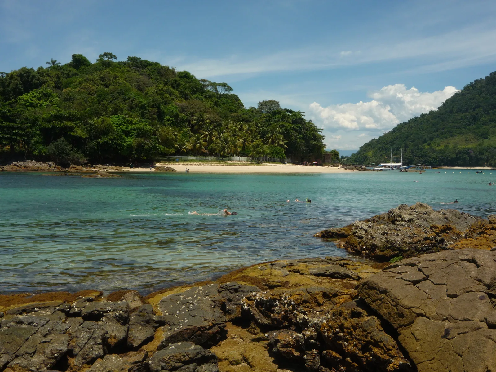 Toward Angra dos Reis the bay opens into a wider scatter of islands and deeper water.