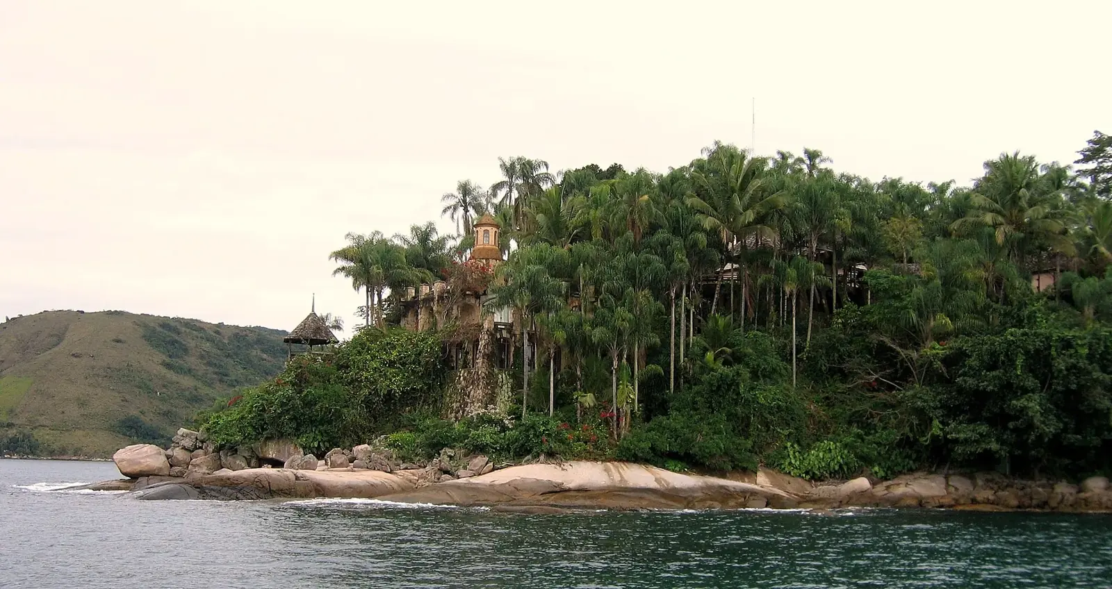 Ilha do Mantimento at the mouth of the Perequê-Açu, seen from the water close to town.