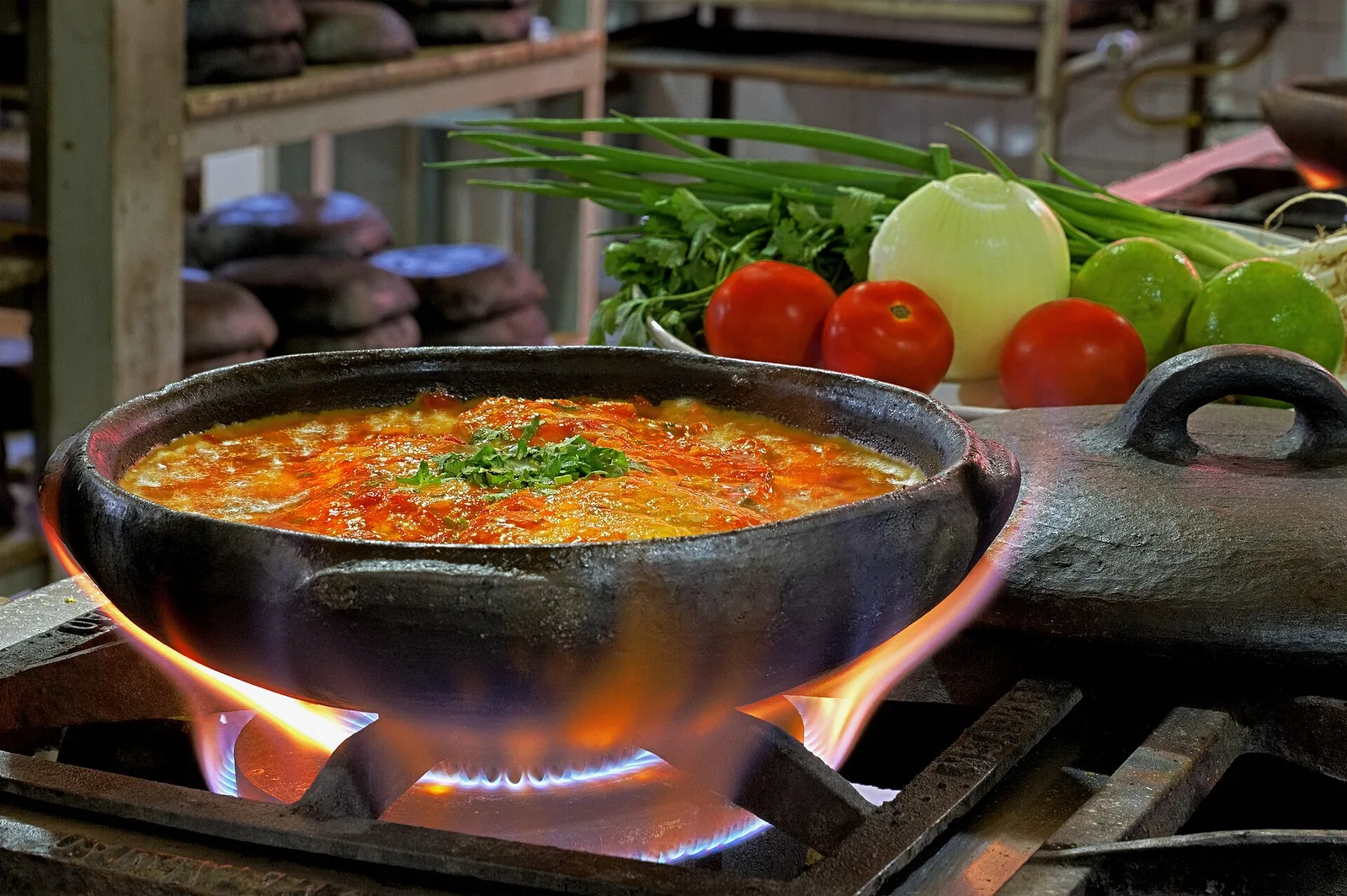 Moqueca, the coastal fish stew, in its traditional clay pot. Fish is the natural centerpiece of a Christmas table on this coast.