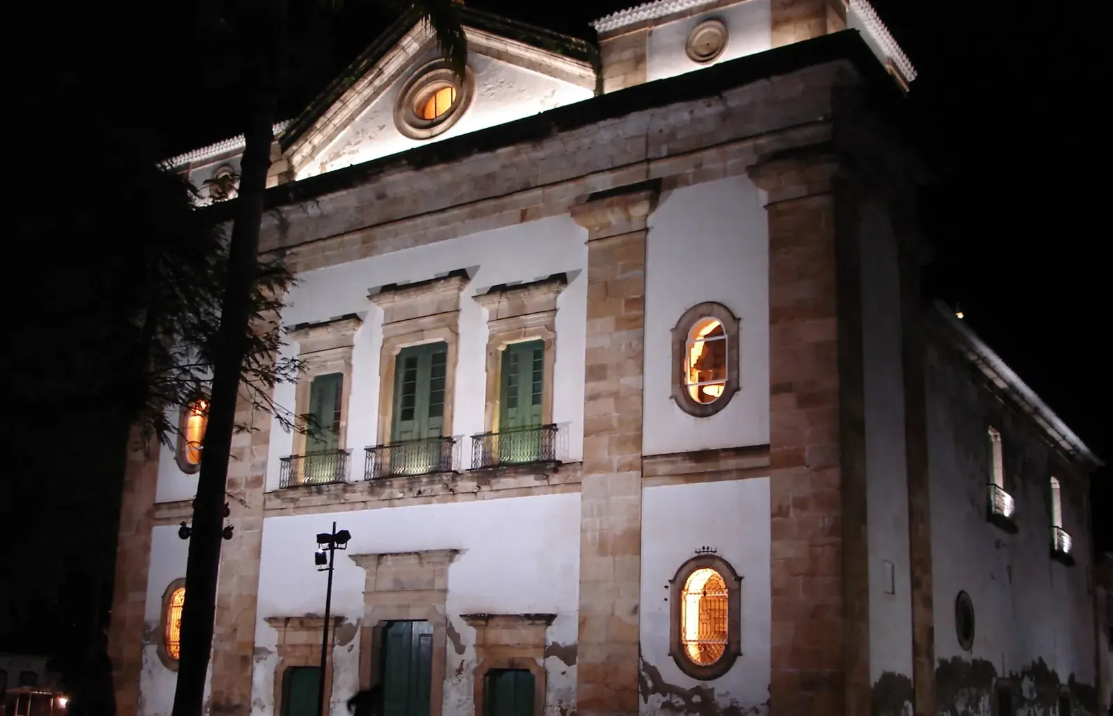The Igreja Matriz de Nossa Senhora dos Remédios lit up at night, photographed on New Year's Day.