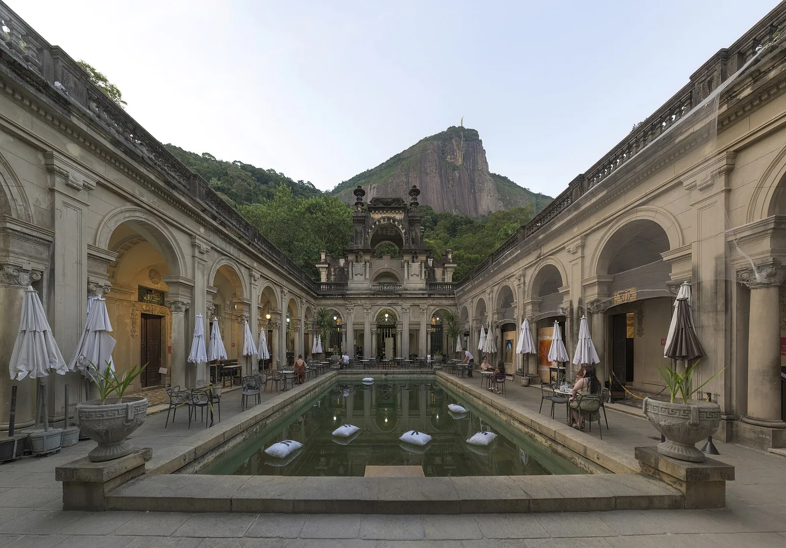Parque Lage at the foot of Corcovado, where a grand old mansion frames the mountain behind.